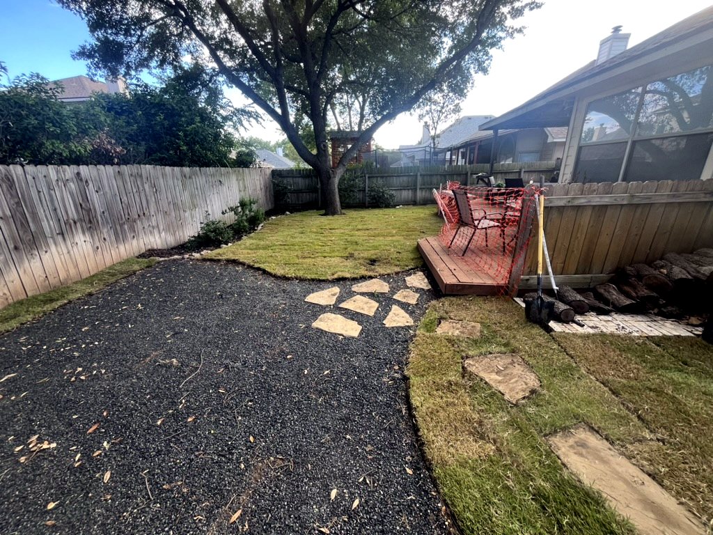 Patio and backyard landscape after Restore My Yard work